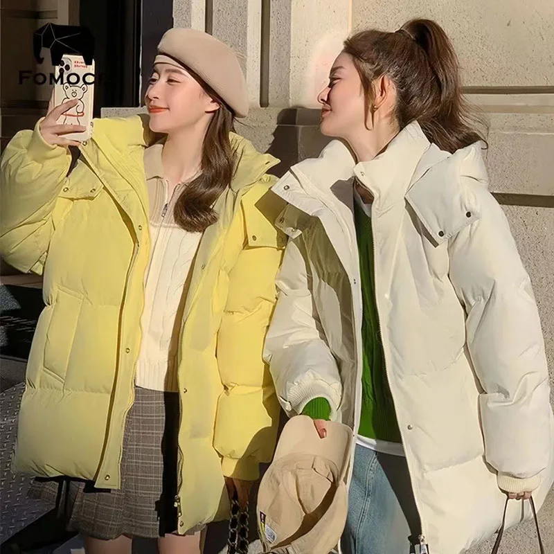 

Новинка 2025 года, однотонная корейская свободная толстая женская хлопковая куртка с длинными рукавами, одежда, зимняя теплая женская хлопковая куртка с капюшоном