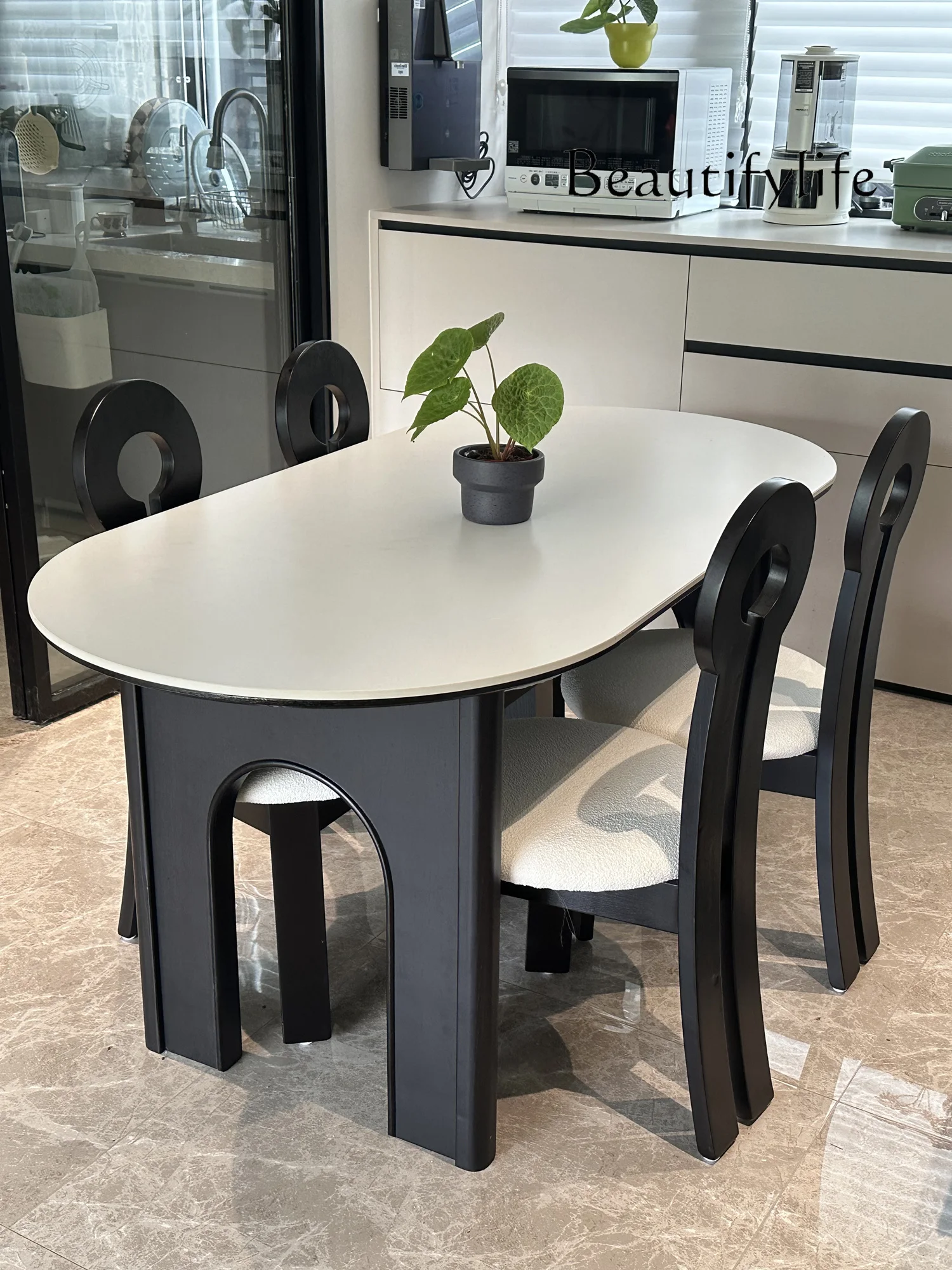 New rock slab dining table and chairs French retro modern simple small apartment oval solid wood dining table