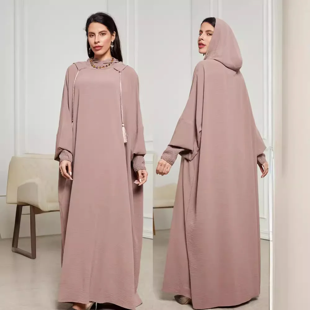 Nouvelle mode musulmane 2025 femmes couleur unie décontracté à la mode élégant à manches longues à capuche Abaya femme Jalabiya vêtements manteau robes