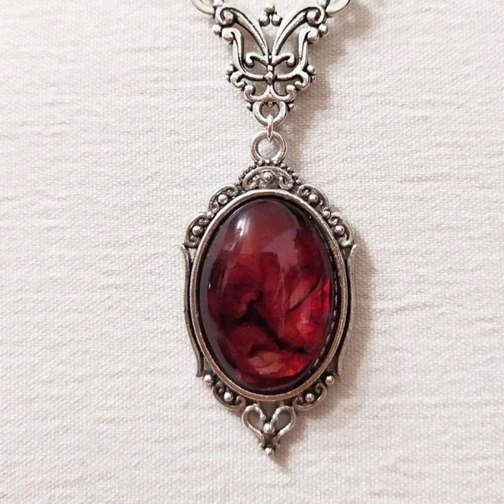 Collar con colgante de piedra roja Vintage para mujer, Color buey plateado, Metal hueco, forma ovalada, piedra, collar bohemio Retro, joyería