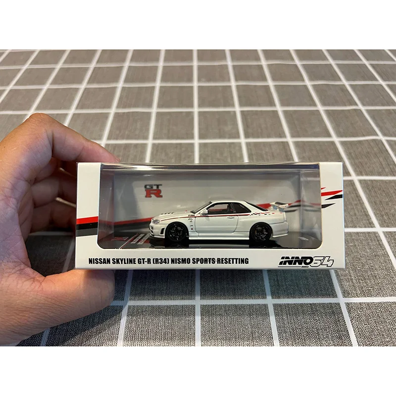 

Inno 1:64 Nissan skyline GT-R (r34) nismo branco коллекция литых под давлением моделей автомобилей игрушки