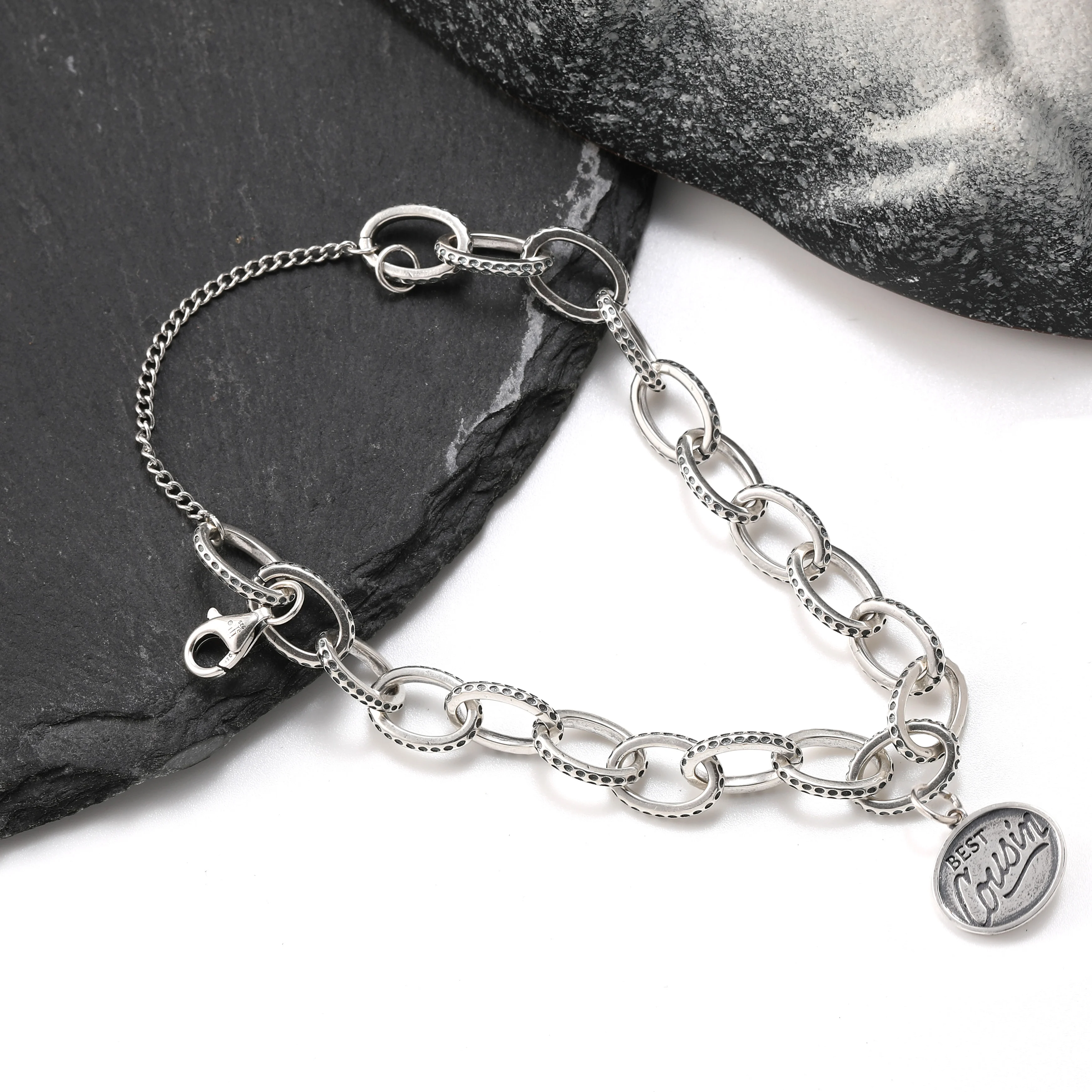 

Genuine 925 sterling silver exquisite Textured Oval Charm Bracelet paired with "Best cousin" pendant