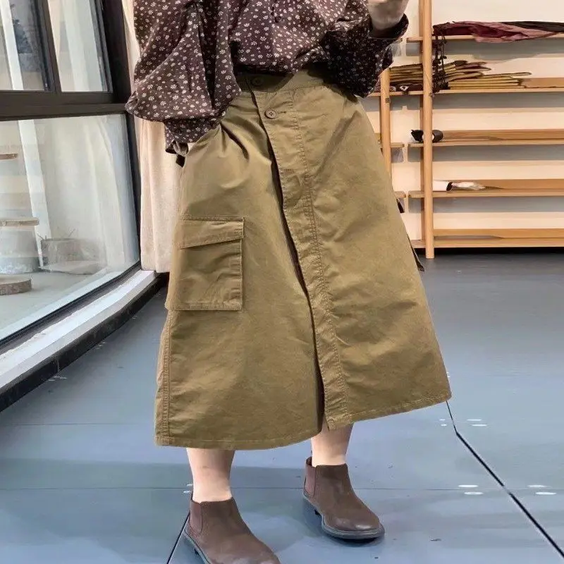 Vêtements de travail rétro et jupe à poches pour femmes en été, mi-longue, décontractée, ample, Slim, jupe trapèze, tendance