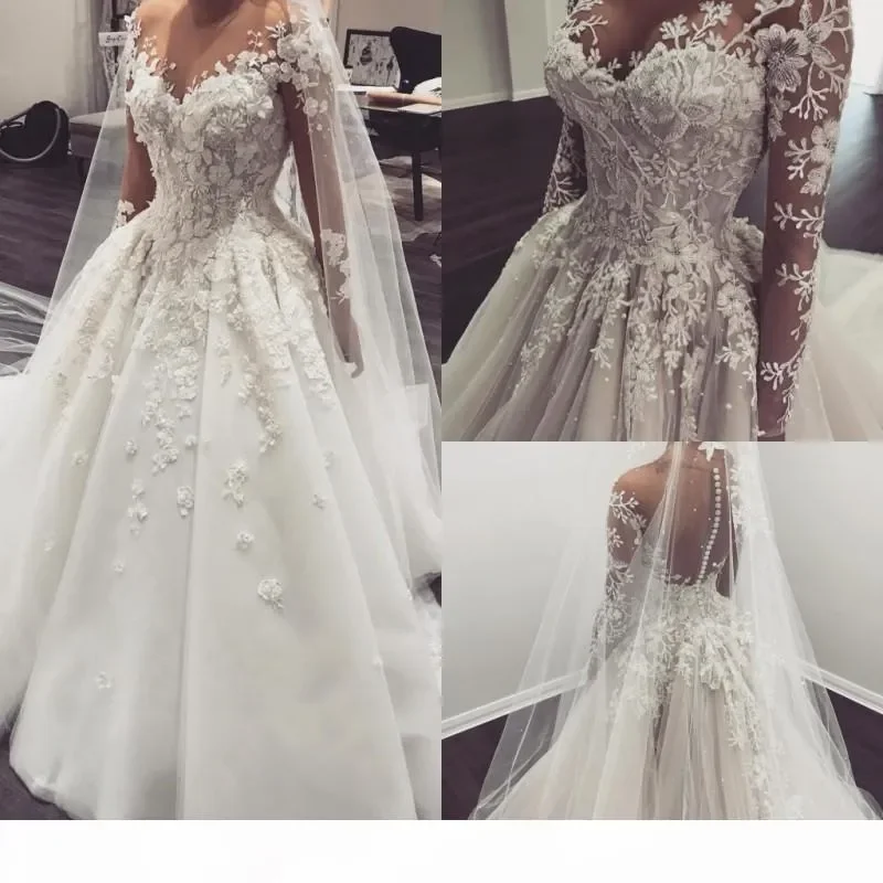 

Gorgeous Long Sleeves Wedding Dresses with 3D Floral Applique 2024 Illusion Covered Buttons Back Bridal Gowns Vestido De Novia