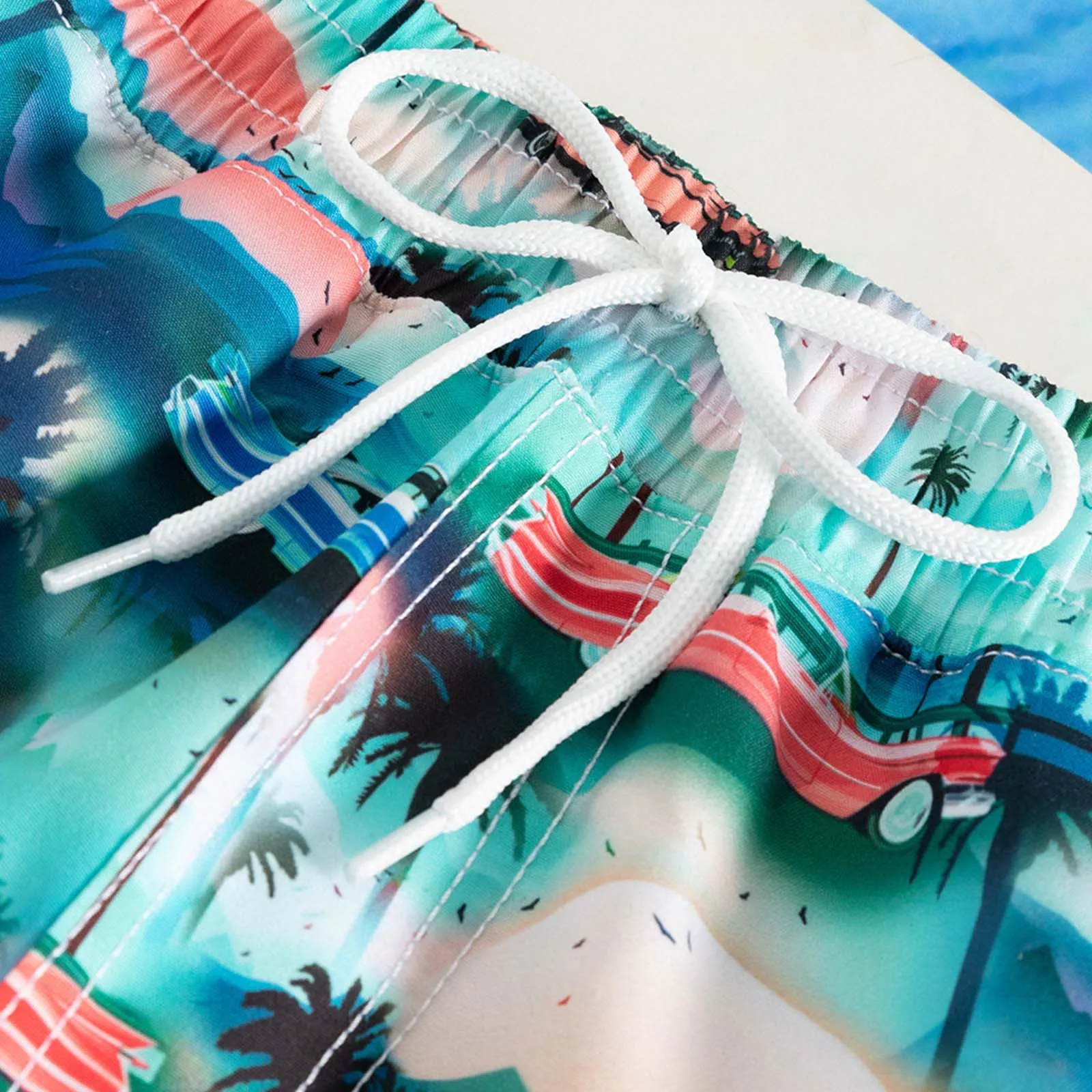 Pantaloncini da bagno stampati per bambini e ragazzi, elastico in vita con fiocco cucito e tasche laterali per il nuoto, il bagno, le vacanze