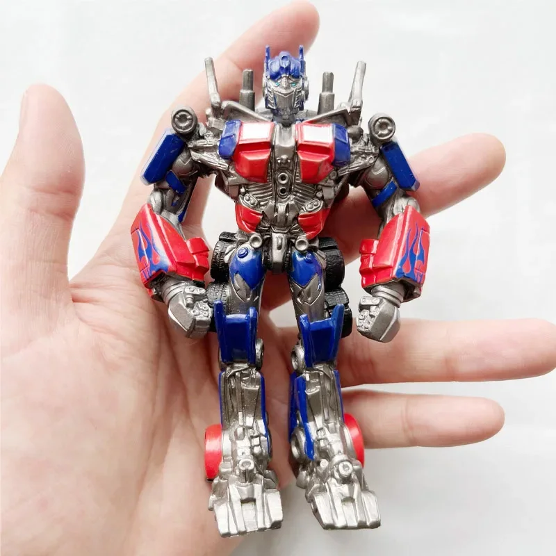 Hasbro Transformers Action Figure Giunti Zaino mobile Ciondolo Optimus Prime Bumblebee per regali per ragazzi Portachiavi con decorazioni per il desktop