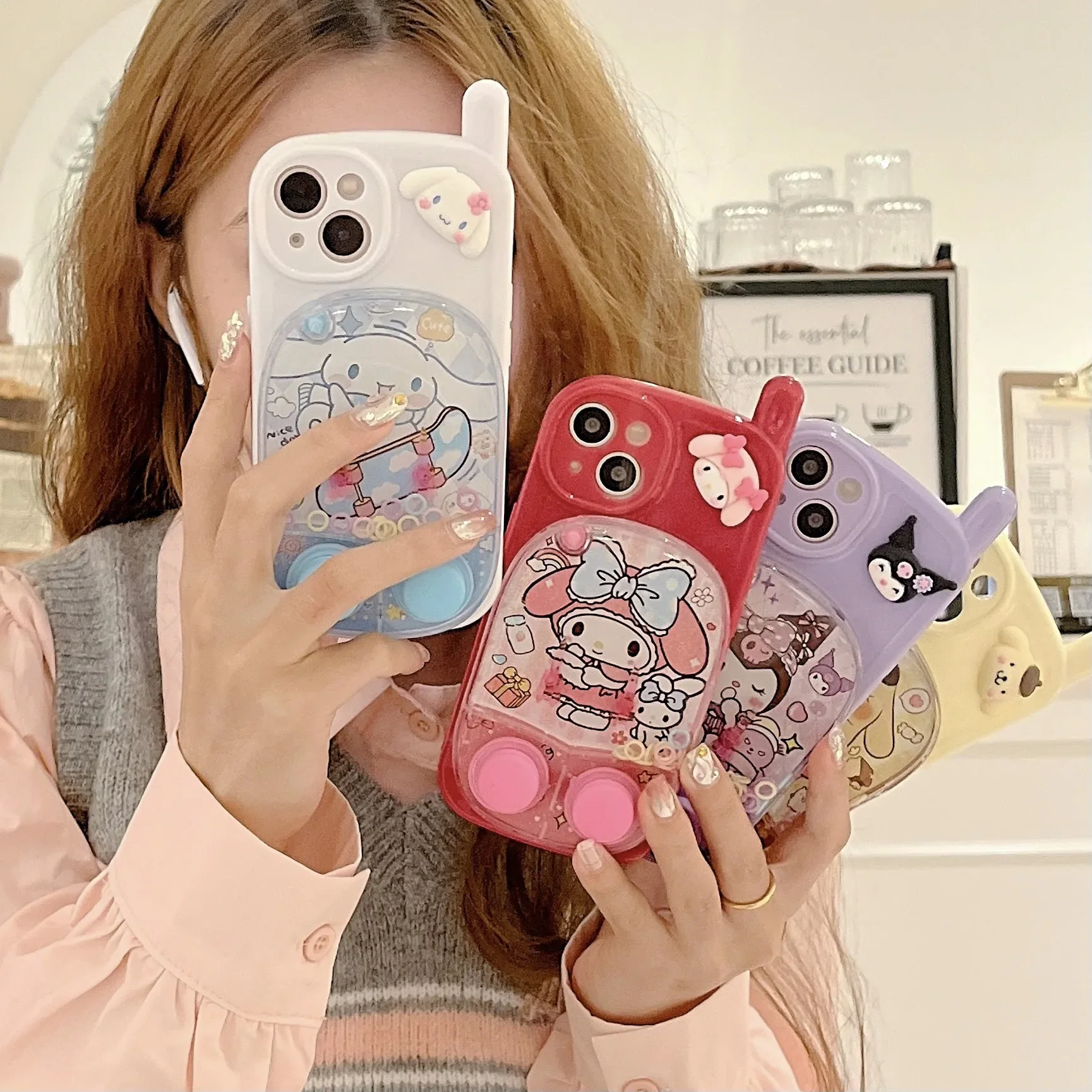 

Miniso Sanrio Kuromi My Melody Cinnamoroll Pudding Dog Cartoon Stereo Game Machine IPhone Phone Shell Decompression Artifact