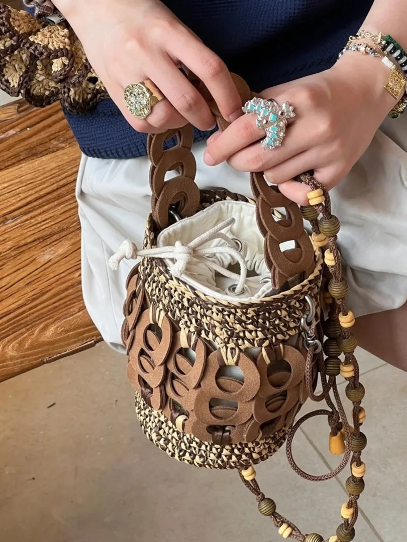 

Fashion versatile niche design hand-woven bucket bag beach bag