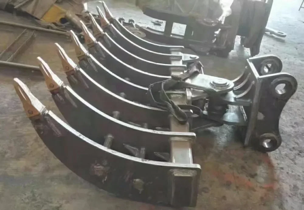 Aangepaste graafmachinehulpstukken Kantelbare wortelhark