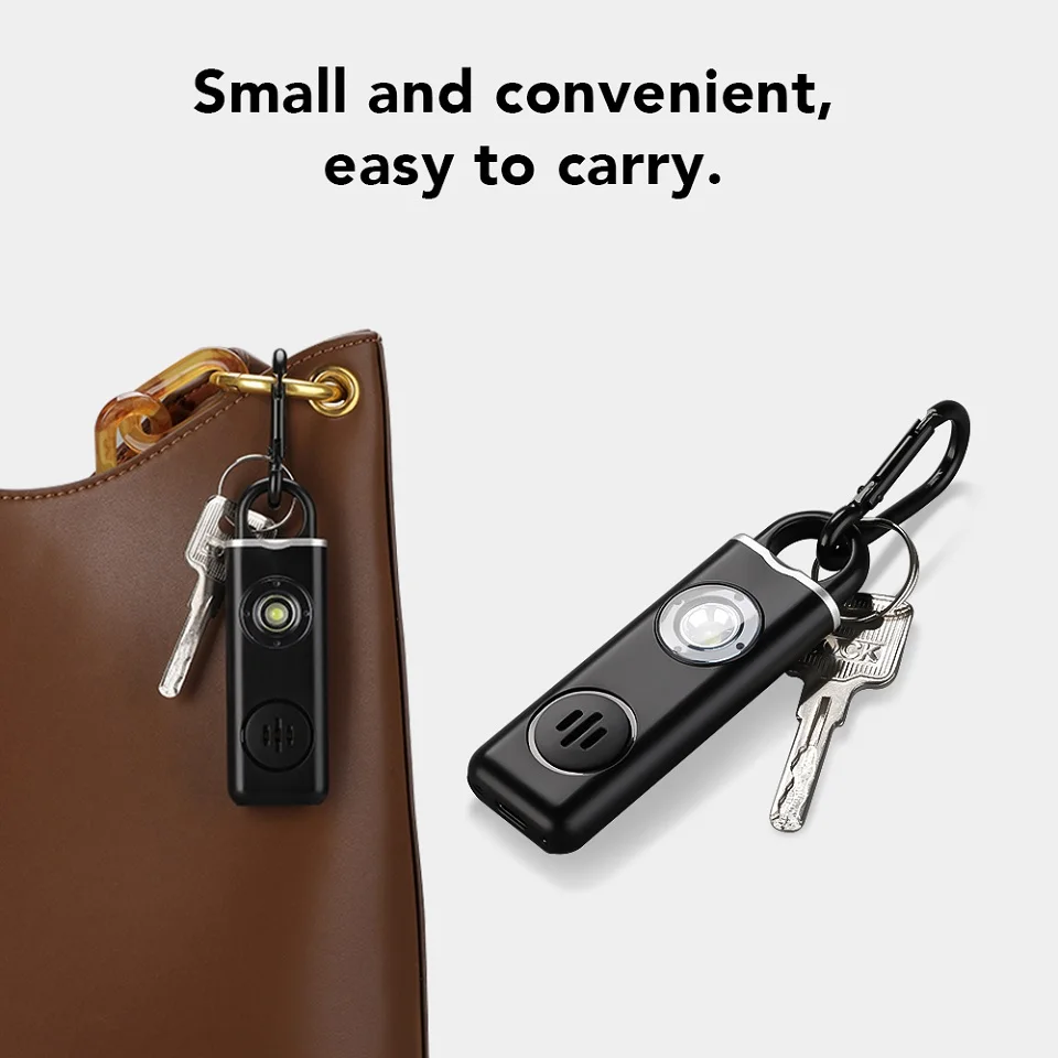 Compact personal safety alarm attached to keys and handbag