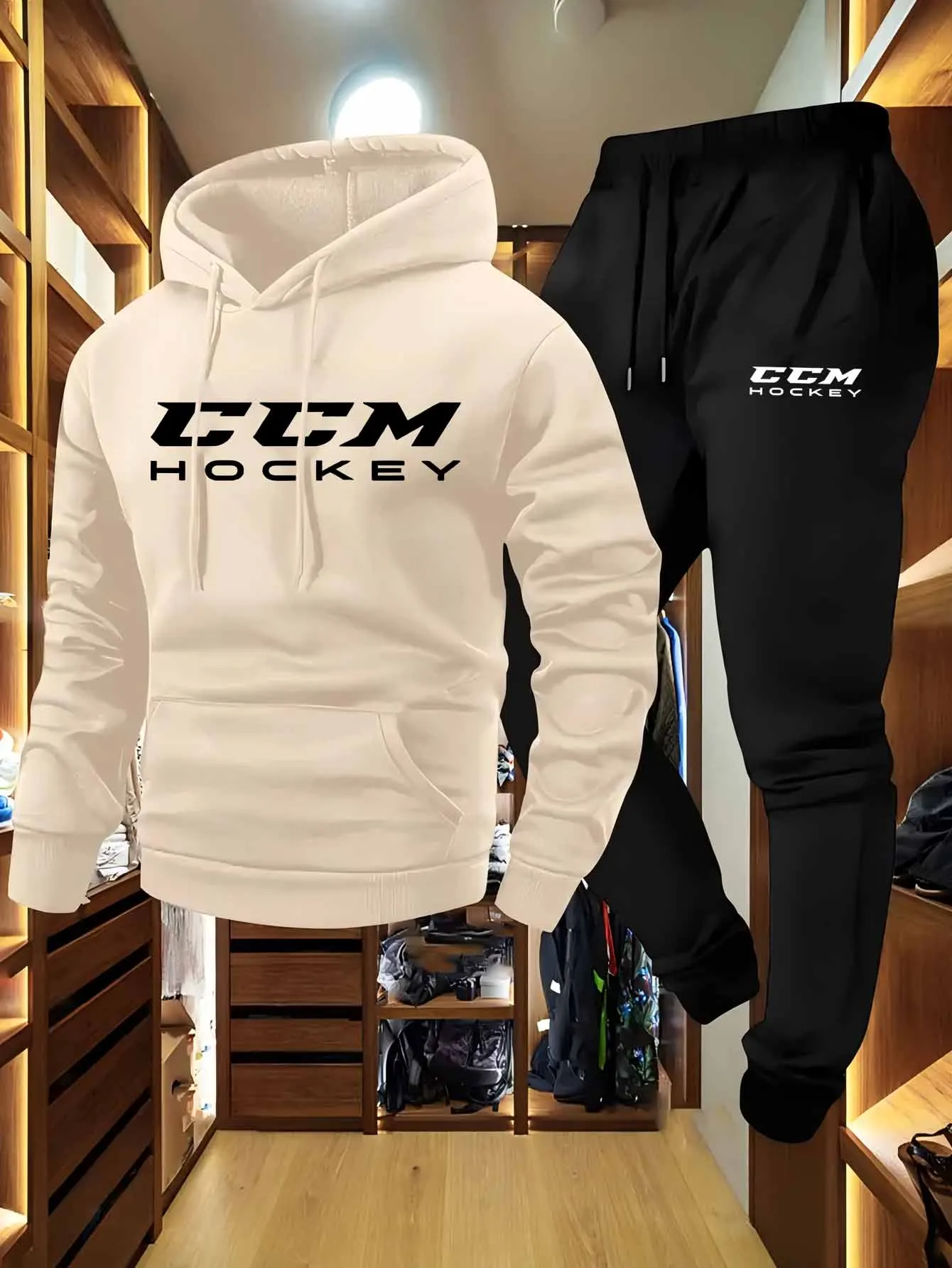 

CCM Men's Casual Athletic Two-Piece Outfit Long Sleeve Hooded Sweatshirt And Joggers Set in Black And Beige with CCM Print