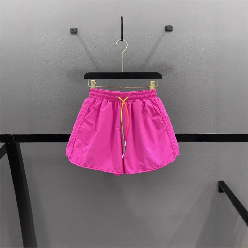 2025 Nuevos pantalones cortos de pierna ancha con cordón de color caramelo transpirable de algodón de verano para mujer