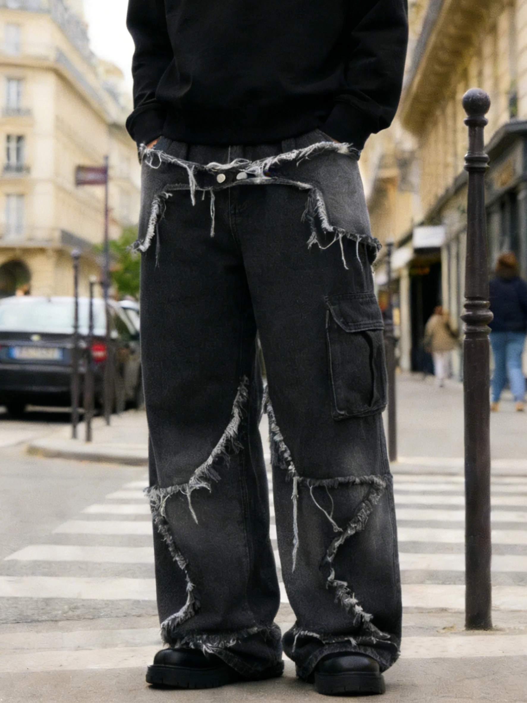 

Dark-style deconstructed workwear jeans, with irregular frayed edges, full of street vibe
