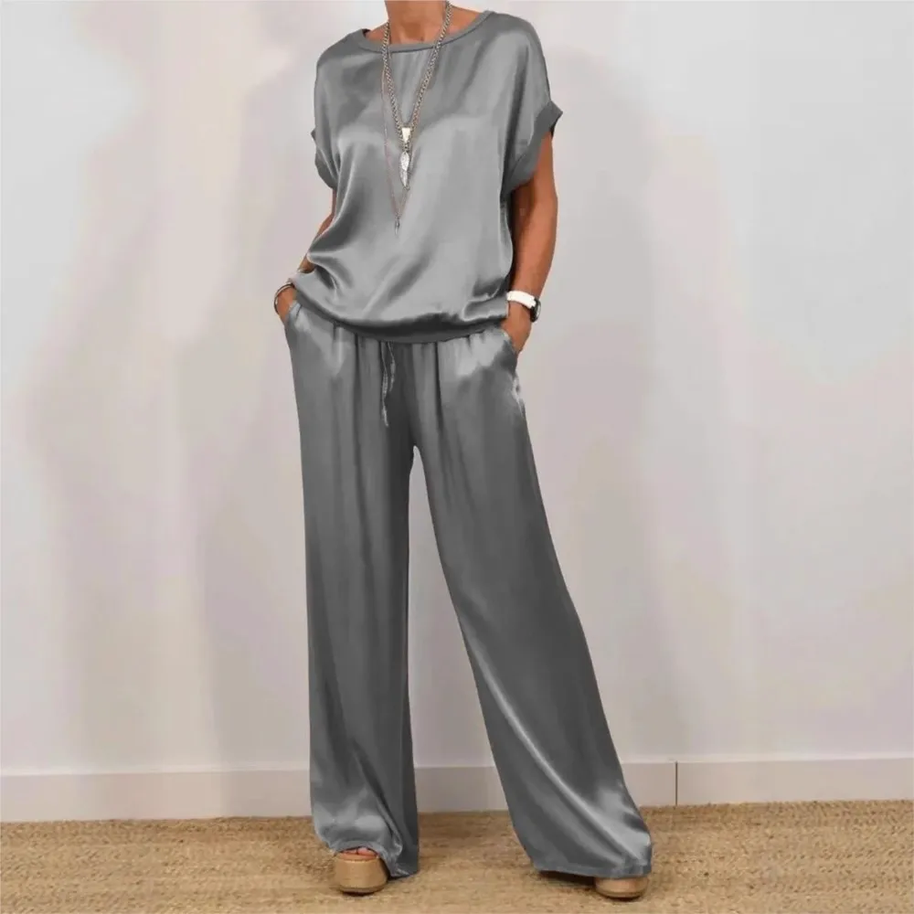 Primavera Nuovo Casual O Collo T-shirt a maniche corte Top in raso Pantaloni lunghi da donna Abito elegante femminile Pantaloni lunghi a gamba larga Set da 2 pezzi