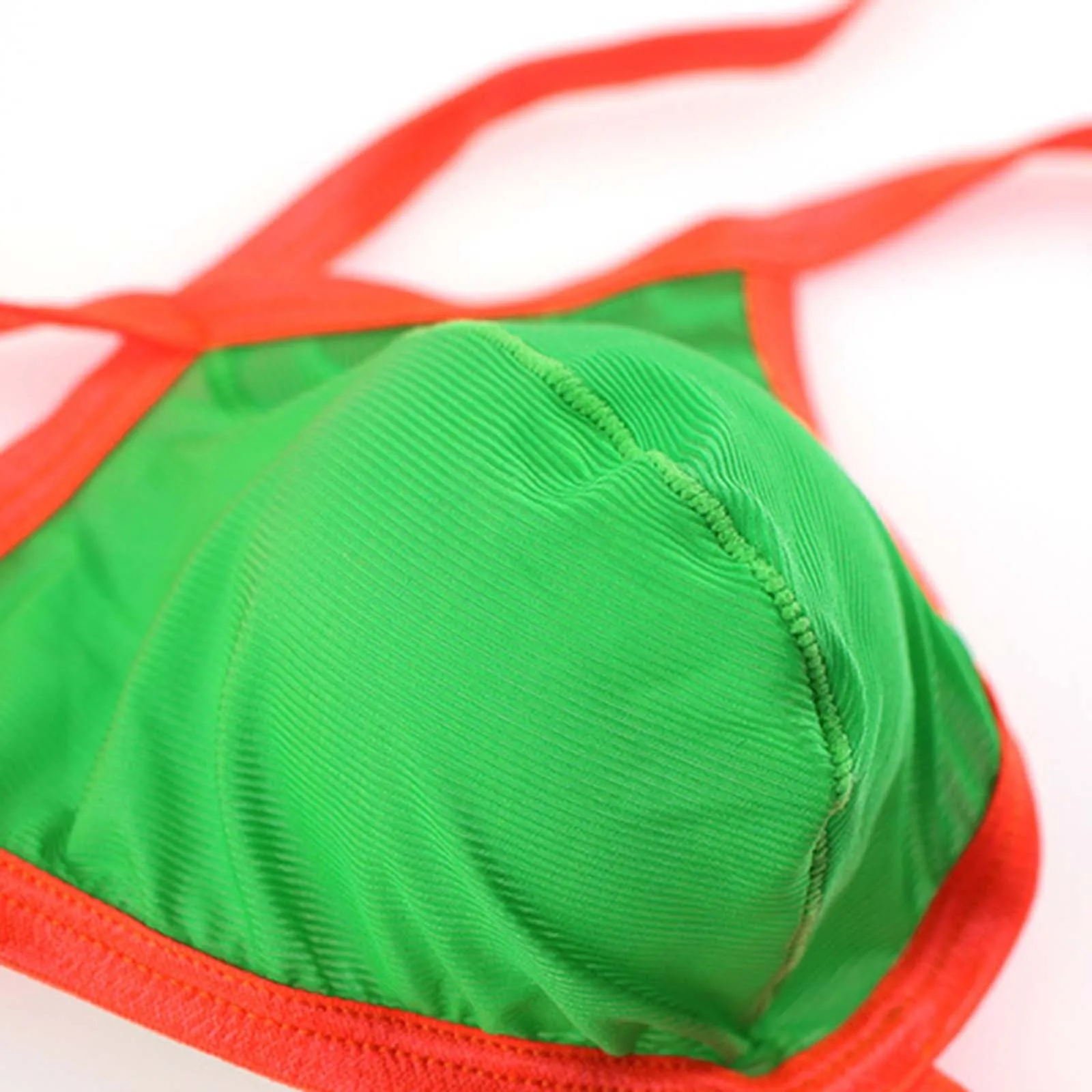 จีสตริงเซ็กซี่สำหรับผู้ชายแฟชั่นระบายอากาศได้ดีสีตัดกันสายรัดเปิดหลังรูปตัวยูเอวต่ำจีสตริง