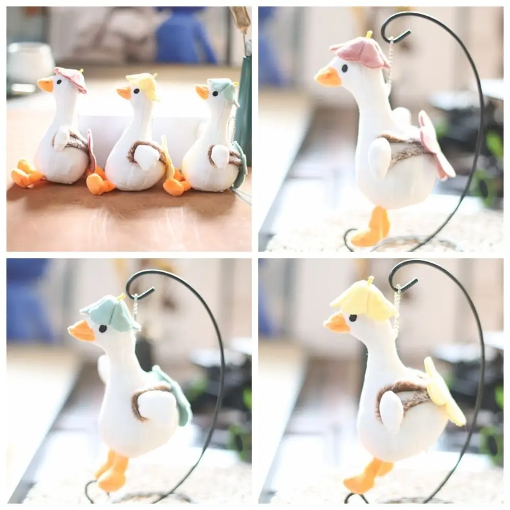 LLavero de ganso blanco grande con flores, colgante de Animal de peluche de estilo coreano, dijes para mochila de dibujos animados, muñeco de peluche de dibujos animados para niños