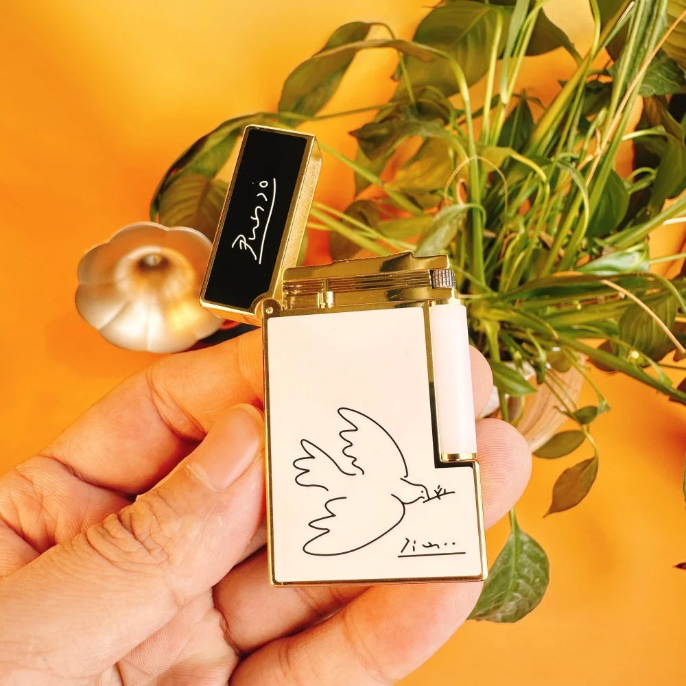 

Branded lighter and cigarette accessories, featuring a dove of peace design, and including customized accessories.