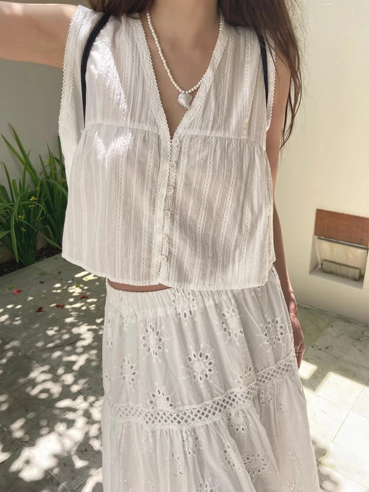 Clothland Women Sweet White Blouse Skirt Suit Sleeveless Shirt Midi Skirts Hollow Out Lace Embroidery Two Piece Set TA451