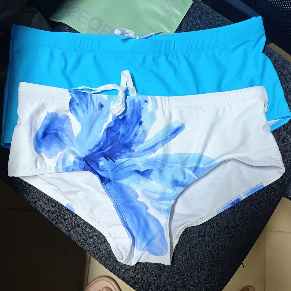 ..2026Men's new Japanese simple covered boxer swimming trunks blue and white trend European and American beach boxers UXH606-1