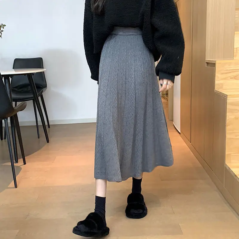 Knitted hip wrap skirt for women's autumn and winter new mid length high waisted slimming versatile A-line pleated skirt