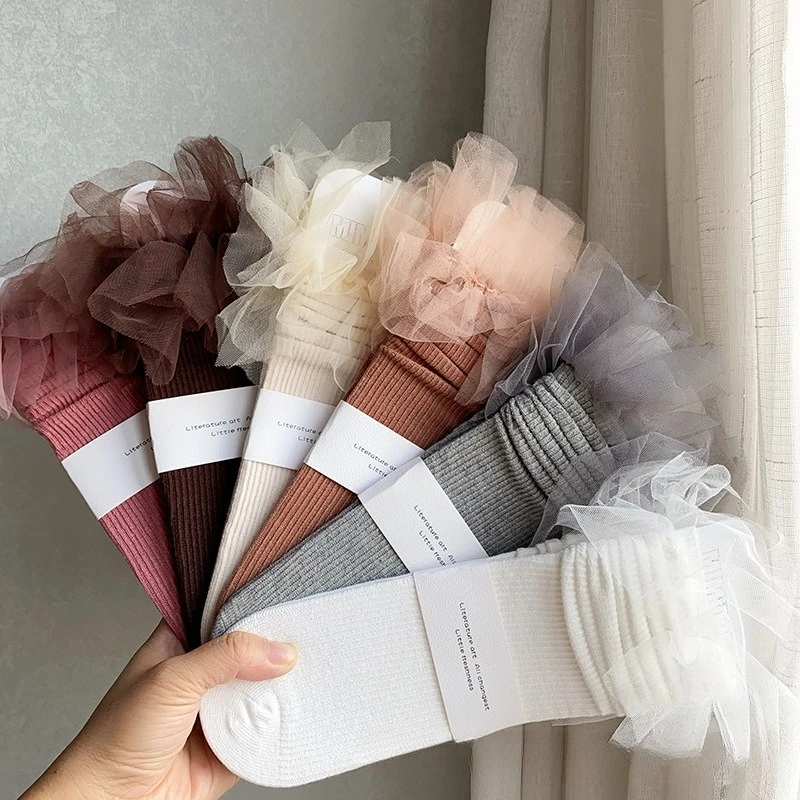 

Girls' mid-tube socks 25 autumn winter new children's cotton Korean version yarn edge princess socks girls' stacking calf socks