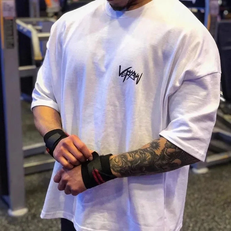 Nowy sportowy T-Shirt z okrągłym kołnierzem Oversize z bawełny letnia koszulka trening koszulka do biegania męska Streetwear z pół rękawem