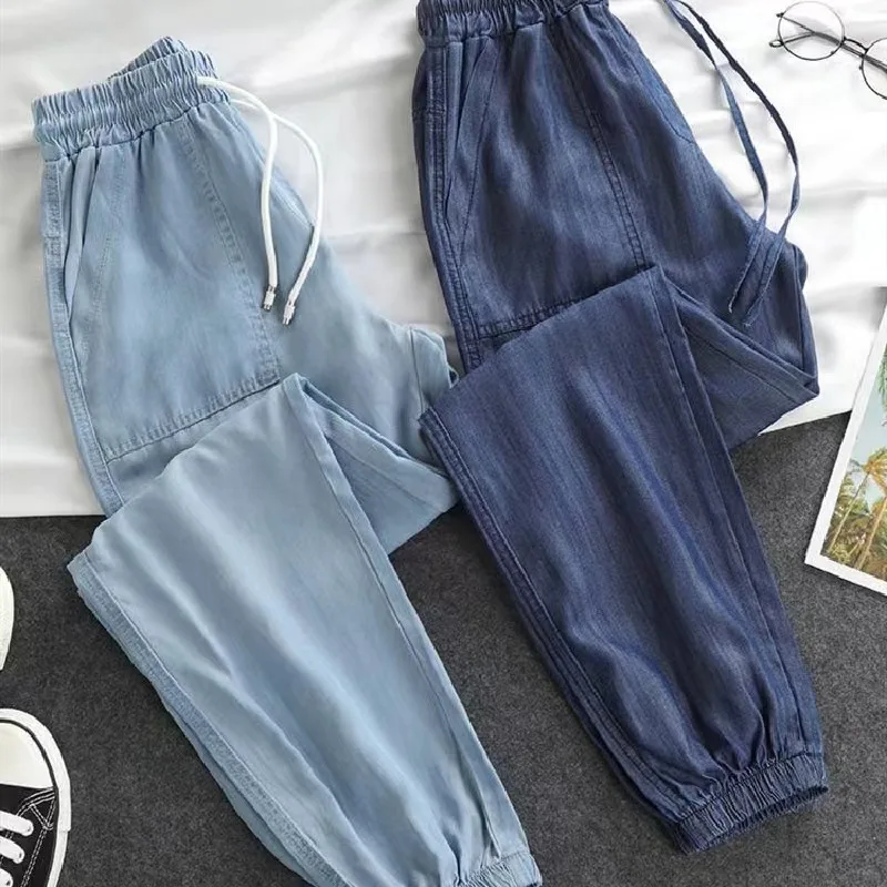 

Summer Thin Ice Silk Jeans Women Elastic High Waist Drawstring Harem Pants Loose All-matched Beam Leg Nine Points Denim Pants