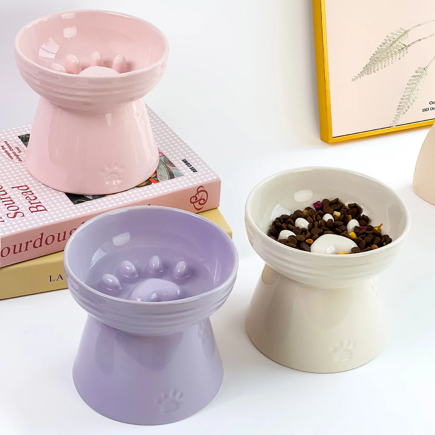 

Creative Cream Wind Cat Claw Modeling High Foot Slow Food Bowl High Value Pet Bowl Ceramic Dog Bowl Anti-choking Slow Food