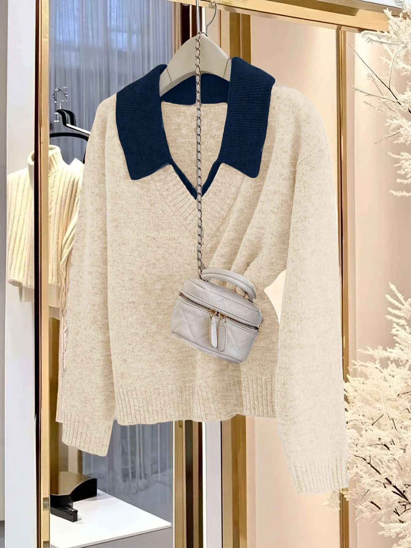 Women's contrast-colored polo neck false two-piece knitted top, elegant and casual style, suitable for autumn and winter