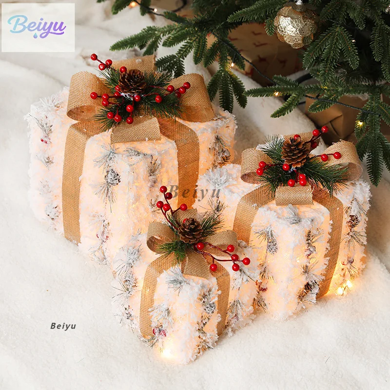 

Christmas with lights, red and black lattice sticky gift box, empty box, pine cone decorative ornament scene arrangement, three-