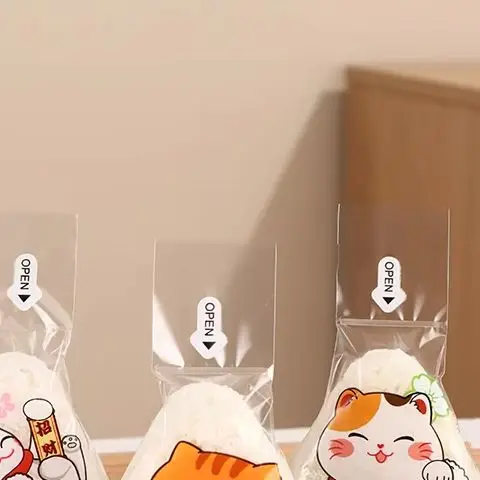 Bolsa de embalaje desechable con bola de arroz triangular japonesa, bolsa para Sushi Nori Onigiri, molde para hacer Sushi, accesorios Bento, 50/100 Uds.