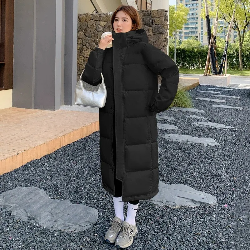 Chaqueta de plumón extendida para mujer, versión coreana 2024, con capucha por encima de la rodilla, chaqueta negra de invierno estilo Academia China tanto