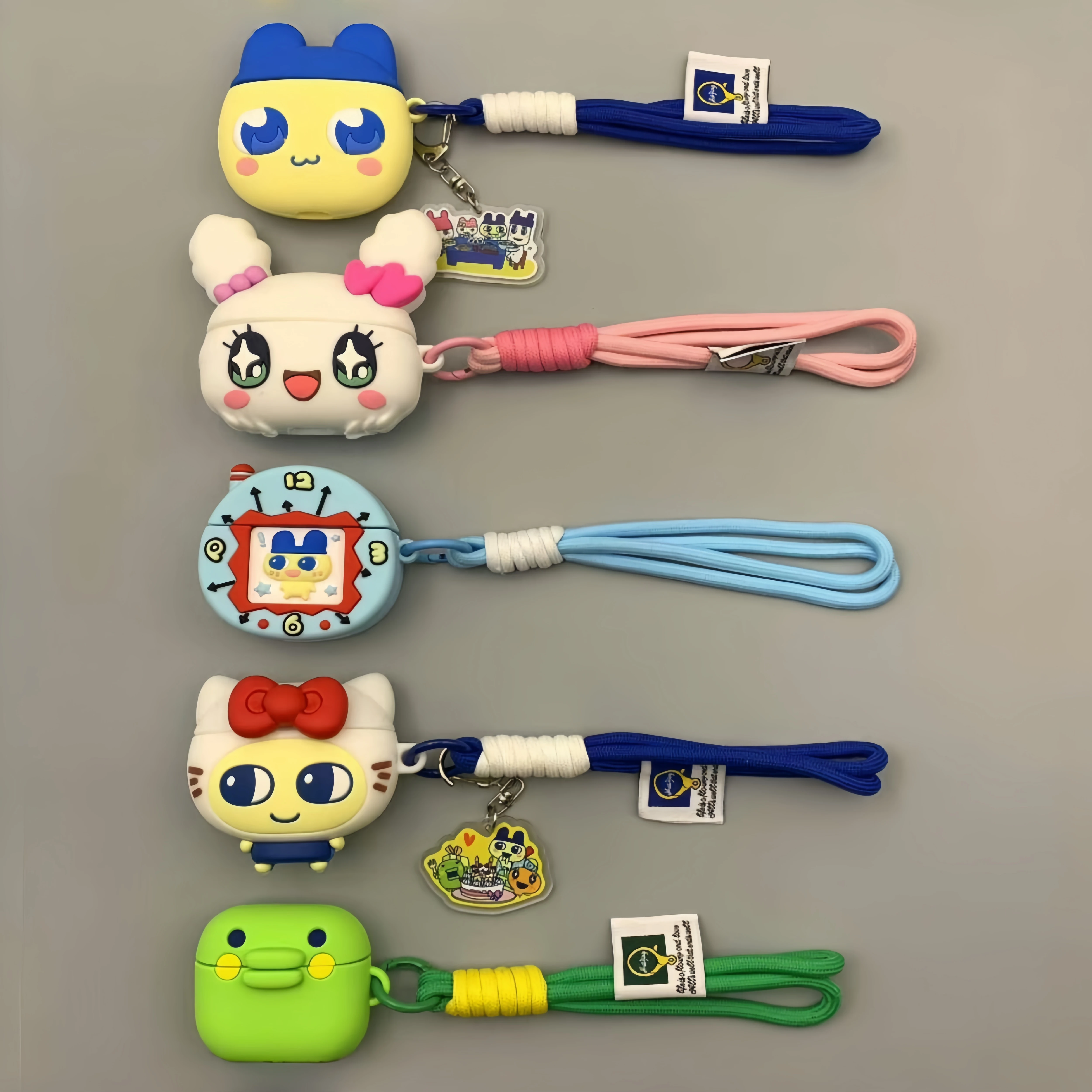 

Cute Tamagotchi Earphone Case Mametchi Kutchipachi Suitable For Airpods Pro 2/3 Earphone Case Soft Pendant Accessories