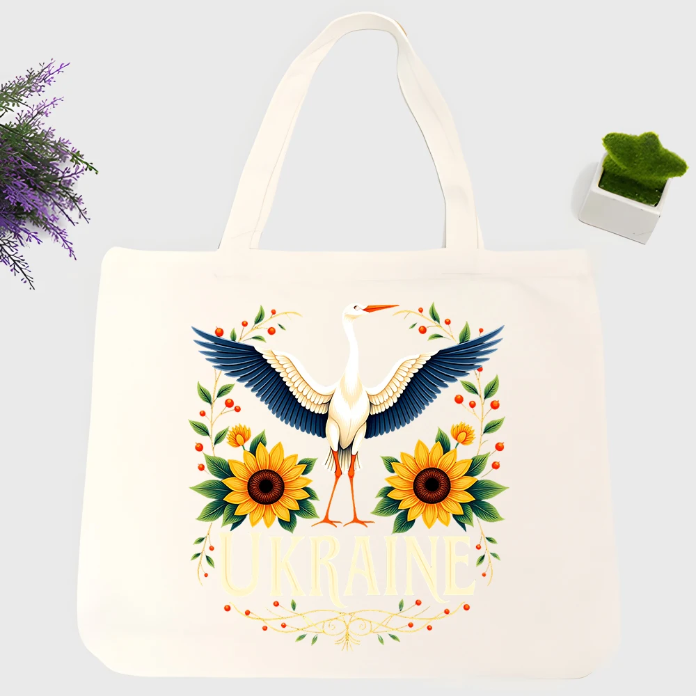 Women's crane and sunflower print canvas tote bag, artistic design for casual daily use and summer outings