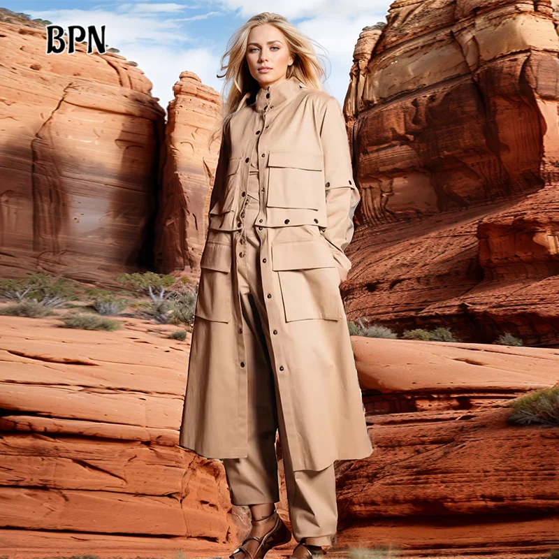 

BPN Solid Patchwork Pockets Casual Trench For Women Lapel Long Sleeve Spliced Single Breasted Loose Minimalist Trench Female New