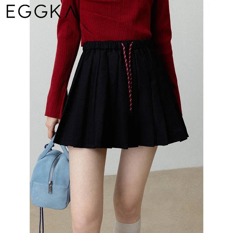 EGGKA-Mini jupe plissée style preppy pour femme, vêtement à taille élastique, mode coréenne, couleur unie, automne 2024