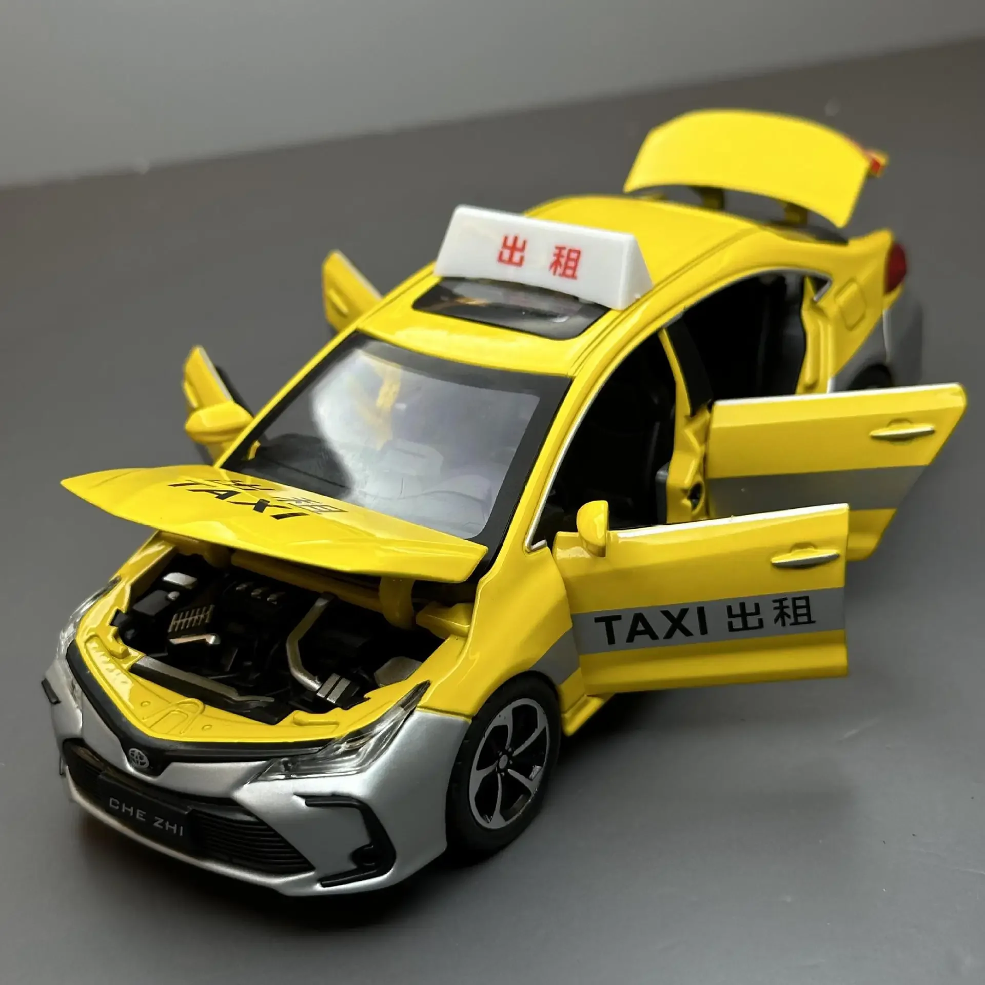 Coche de aleación de Toyota Corolla taxi, vehículo fundido a presión y de juguete, modelo de coche, sonido y luz, juguetes para niños, regalos A633, 1:32