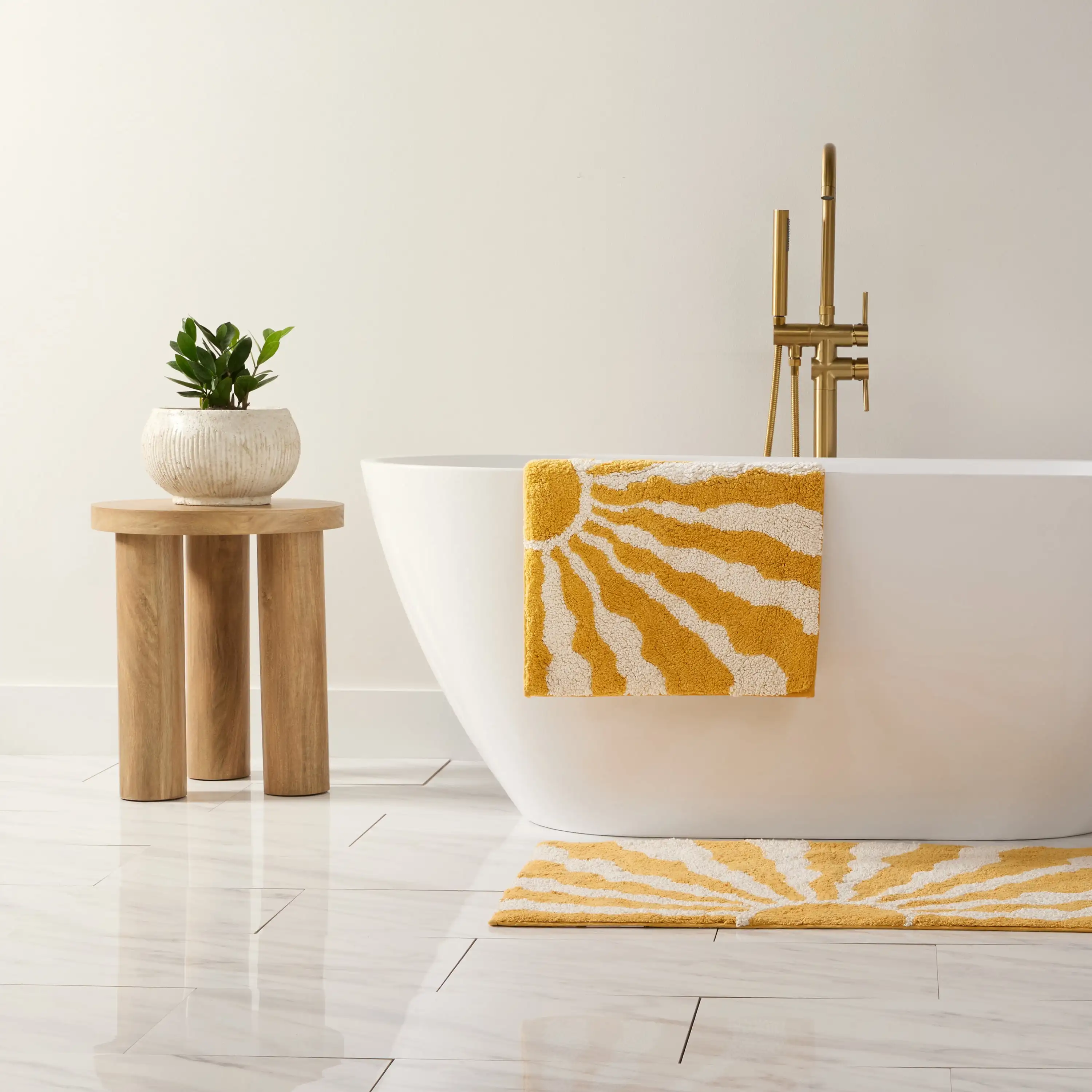 

Modern absorbent cotton bath mat measuring 24 inches by 17 inches in vibrant yellow color for bathroom decor
