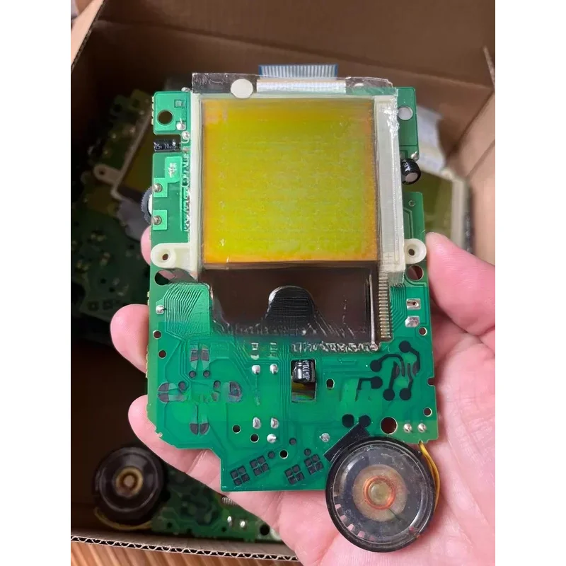 Is Gray White, Game Console, And First Generation Display Screen.