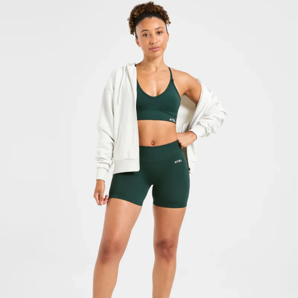 Conjunto Deportivo y de Yoga para Mujer: Shorts de Compresión Sin Costuras y Sujetador Deportivo de Yoga—Antideslizante, Transpirable y Seguro.