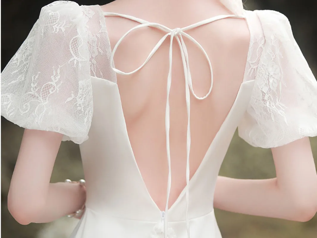 Bellissimi abiti da sposa affascinanti che dimagriscono semplici abiti da sposa Sexy aperti sul retro in pizzo elegante abito da sera