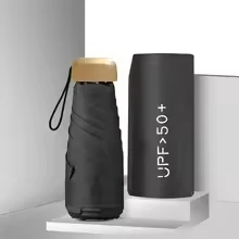 Mini paraguas de bolsillo para lluvia, sombrilla plegable de vinilo con protección ultravioleta UV, parasol de bolsillo, cápsula