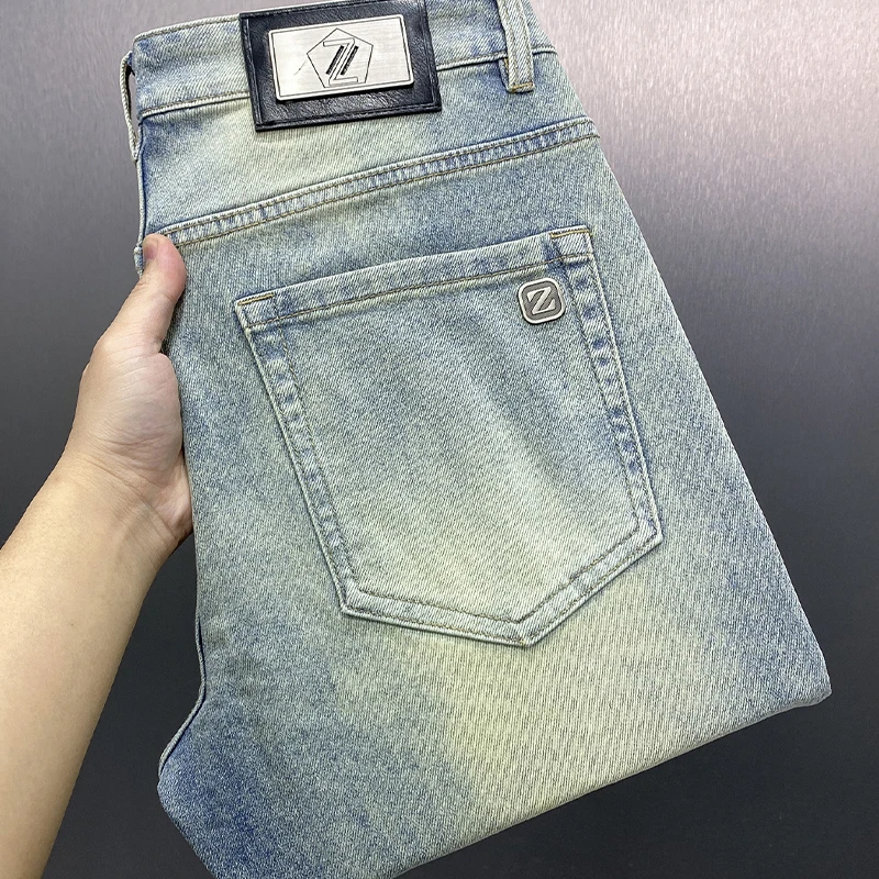 

Мужские джинсы с низкой посадкой, распродажа, две пуговицы, осенняя новинка, зауженный крой, длина до щиколотки, эластичный пояс на резинке