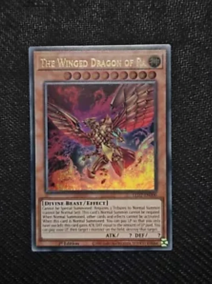 

Yugioh KONAMI Duel Monsters LED7-EN000 The Winged Dragon of Ra Ultra Rare English 1st Edition Collection Mint Card