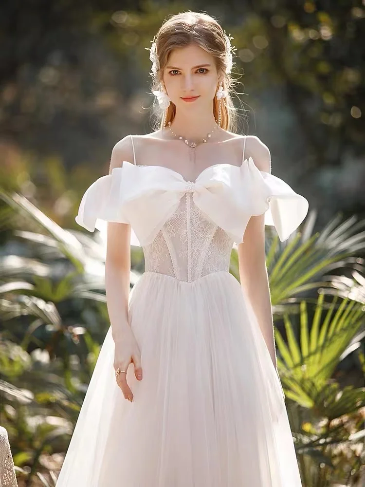 

Boho Off The Shoulder Tulle Wedding Dresses Elegant White Spaghetti Strap Princess Party Lace Up Beach Bridal Celebrity Gown New