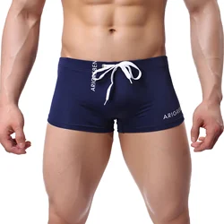 Neue Herren Badeanzug sexy Bade bekleidung Bades horts Beach wear Sporta nzüge Surf board Shorts Mesh Pouch Badehose Hombre