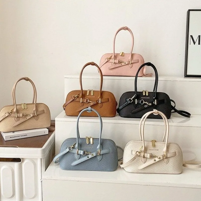 

Стильная дизайнерская сумка для подгузников для женщин, роскошная кожаная сумка-тоут, элегантная сумка через плечо, уникальная и модная.