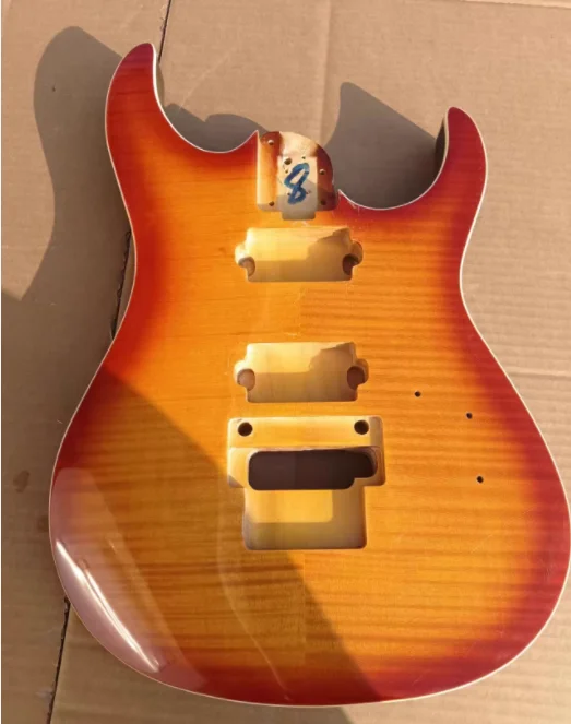 

A Song Alliance double rocking electric guitar body, tiger patterned maple veneer, sunset yellow, very beautiful, almost brand n