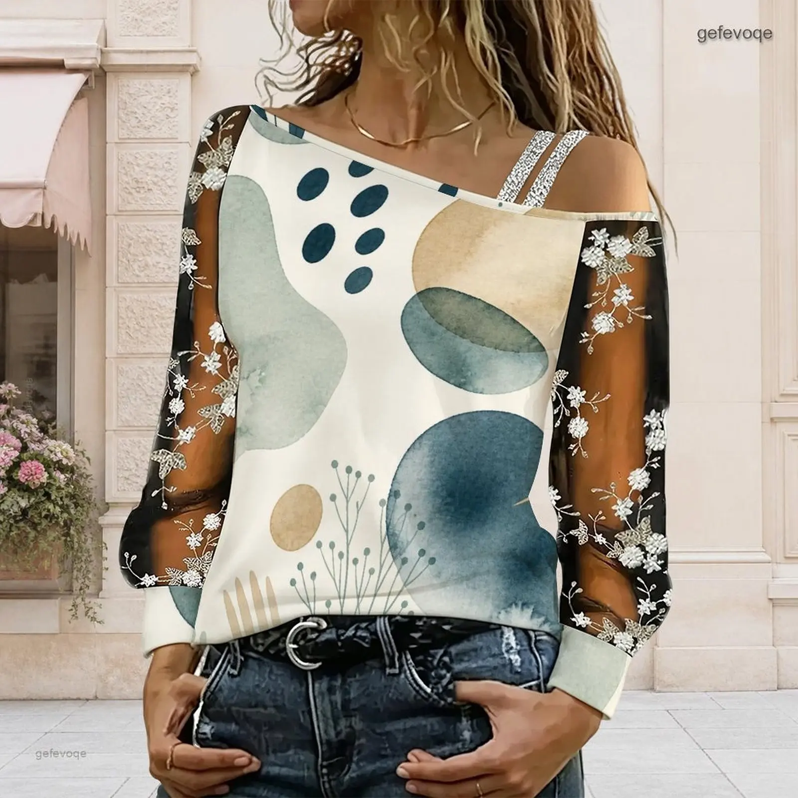 Women Abstract Face Printed Asymmetric Cold Shoulder Long Sleeve Top with Floral Embroidered Sheer Sleeves