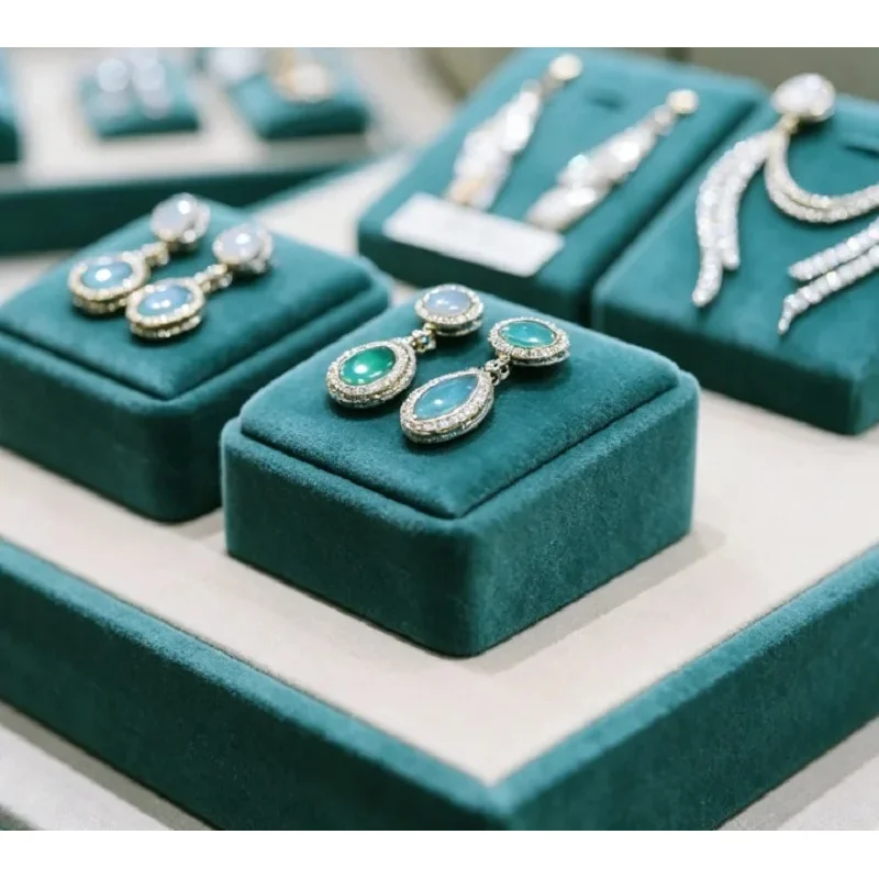 custom.Luxury Octagonal Glass Jewelry Display Counter, Modern Retail Showcase with Teal Velvet Inserts & LED Lighting